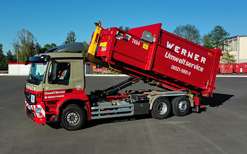 Abrollkipper mit Ladekran